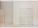 Bedroom with double door closet and tile floors at 1073 Humphrey Blvd, Deltona, FL 32738