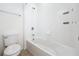 Clean bathroom, featuring a toilet, bathtub, and shower at 12285 Joshua Tree Trl, Windermere, FL 34786