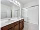 Bathroom with double vanity, tub and shower at 12285 Joshua Tree Trl, Windermere, FL 34786