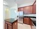 Modern kitchen with stainless steel appliances and granite countertops at 12285 Joshua Tree Trl, Windermere, FL 34786