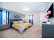 Bedroom with a king-size bed and dresser at 1230 Aloha Blvd, Davenport, FL 33897