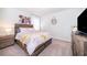 Bedroom with a queen-size bed and dresser at 1230 Aloha Blvd, Davenport, FL 33897