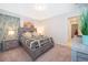 Bedroom with a queen-size bed and dresser at 1230 Aloha Blvd, Davenport, FL 33897