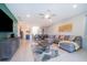 Spacious living area with sectional sofa and access to backyard at 1230 Aloha Blvd, Davenport, FL 33897