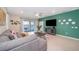 Gathering room with flat-screen TV and view of the pool area at 1230 Aloha Blvd, Davenport, FL 33897