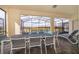 Outdoor patio with dining table and chairs, overlooking the pool at 1230 Aloha Blvd, Davenport, FL 33897