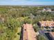 Aerial view showcasing townhouses and surrounding landscape at 1300 Gilford Point Ln # 1300, Davenport, FL 33896