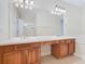 Bathroom boasts a double vanity and large mirror at 1300 Gilford Point Ln # 1300, Davenport, FL 33896