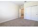 Spacious bedroom with double door closet and neutral decor at 1300 Gilford Point Ln # 1300, Davenport, FL 33896