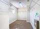 Spacious walk-in closet with wire shelving and carpeting at 1300 Gilford Point Ln # 1300, Davenport, FL 33896