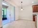 Bright dining area with sliding glass doors to patio at 1300 Gilford Point Ln # 1300, Davenport, FL 33896
