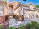Townhome with attached garage and landscaped walkway at 1300 Gilford Point Ln # 1300, Davenport, FL 33896