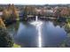 Aerial view of lake with central fountain at 1300 Gilford Point Ln # 1300, Davenport, FL 33896