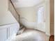 Bright foyer with staircase, tile flooring, and neutral walls at 1300 Gilford Point Ln # 1300, Davenport, FL 33896