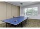 Community game room with ping pong table at 1300 Gilford Point Ln # 1300, Davenport, FL 33896