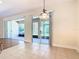 View of kitchen with access to screened patio at 1300 Gilford Point Ln # 1300, Davenport, FL 33896