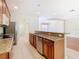 Kitchen with granite countertops and island, stainless steel appliances at 1300 Gilford Point Ln # 1300, Davenport, FL 33896