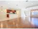 Open concept kitchen and dining area with hardwood floors and modern cabinetry at 1300 Gilford Point Ln # 1300, Davenport, FL 33896