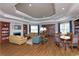 Community clubhouse library with ample seating and bookshelves at 1300 Gilford Point Ln # 1300, Davenport, FL 33896