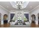 Elegant community clubhouse lobby with comfortable seating and high ceilings at 1300 Gilford Point Ln # 1300, Davenport, FL 33896