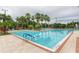 Inviting community pool with ample deck space and lounge chairs at 1300 Gilford Point Ln # 1300, Davenport, FL 33896