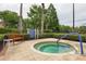 Relaxing community hot tub with surrounding landscaping at 1300 Gilford Point Ln # 1300, Davenport, FL 33896