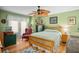 Light and airy bedroom with wood floors and plenty of natural light at 19430 Sarmundham St, Orlando, FL 32833