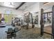 Well-equipped fitness center with green flooring and mirrors at 2097 Celebration Blvd, Celebration, FL 34747