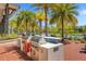 Outdoor grilling station with stainless steel grills at 2097 Celebration Blvd, Celebration, FL 34747