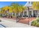Community pool area with seating and palm trees at 2097 Celebration Blvd, Celebration, FL 34747