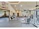 Modern fitness center with various equipment and mirrors at 25629 Hawks Run Ln, Sorrento, FL 32776