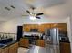 Modern kitchen featuring stainless steel appliances and ample cabinetry at 3021 Norvell Ct, Deltona, FL 32738