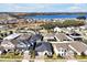 Neighborhood overview with lake and various houses at 3359 Hanging Tide St, Winter Garden, FL 34787