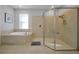 Spa-like bathroom with soaking tub and walk-in shower at 3359 Hanging Tide St, Winter Garden, FL 34787