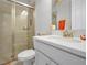 Clean bathroom with a shower/tub combo and white vanity at 3359 Hanging Tide St, Winter Garden, FL 34787