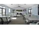 Spacious community room with tables and chairs for gatherings at 3359 Hanging Tide St, Winter Garden, FL 34787