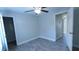 Spacious bedroom with ceiling fan and walk-in closet at 3625 Lone Pine Dr, Orlando, FL 32822