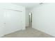 Bedroom with double door closet and carpet flooring at 5021 Bougainvillea Ct, Lake Hamilton, FL 33851