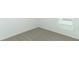 Empty bedroom with carpet flooring and window at 5021 Bougainvillea Ct, Lake Hamilton, FL 33851