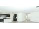 Modern kitchen with dark cabinets, stainless steel appliances, and an island at 5021 Bougainvillea Ct, Lake Hamilton, FL 33851