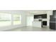 Bright kitchen with dark cabinets, stainless steel appliances, and an island at 5021 Bougainvillea Ct, Lake Hamilton, FL 33851