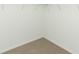 Spacious walk in closet with neutral carpet at 5021 Bougainvillea Ct, Lake Hamilton, FL 33851