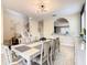 Bright dining room with a large table and an open concept design at 5303 Wildwood Way, Davenport, FL 33837