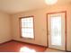 Bright entryway with wood floors, a window, and a glass door at 536 Fourwind St, Deltona, FL 32725