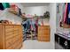 Spacious walk-in closet with ample shelving and drawers at 541 Cantabria Dr, Davenport, FL 33837