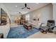 Open concept living room with view into kitchen and dining areas at 541 Cantabria Dr, Davenport, FL 33837