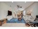 Open living room with a view of the kitchen and dining area at 541 Cantabria Dr, Davenport, FL 33837
