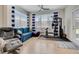 Sunroom with home gym equipment and comfortable seating at 541 Cantabria Dr, Davenport, FL 33837