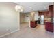 Modern kitchen with stainless steel appliances and granite countertops at 659 Fortanini Cir, Ocoee, FL 34761