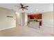 Open concept kitchen with island and sliding glass door to patio at 659 Fortanini Cir, Ocoee, FL 34761